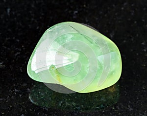 tumbled Prehnite rock on black