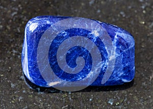 tumbled Sodalite rock on black