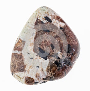 tumbled spreustein in microcline stone on white