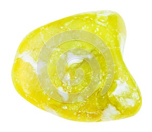 Tumbled yellow lizardite gemstone isolated