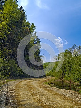 The Tumbling of road beside declivity of mountain photo