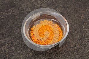 Tumeric powder in the bowl