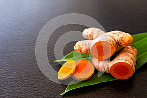 Tumeric  Turmeric  root with green leaf