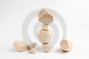 Tumi-ishi puzzle game. Construction of an unstable wooden block tower. The process of the game.