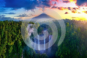 Tumpak Sewu Waterfall and Semeru mountain at sunrise, Indonesia