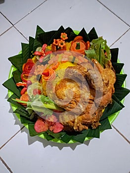 Tumpeng or tumpeng rice is a dish served at Indonesian traditional ceremonies