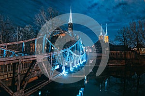 Tumski Bridge at night in Wroclaw, Poland
