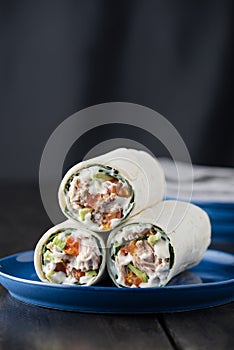 Tuna burritos with avocado tomato and mayonnaise