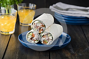 Tuna burritos with avocado tomato and mayonnaise