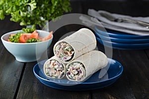 Tuna burritos with cucumber red onion and mayonnaise