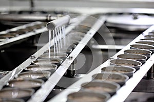 Tuna fish in can processing in factory