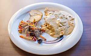 Tuna fish with green salad and tomatos