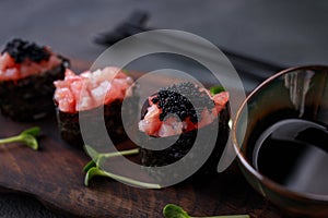 Tuna gunkan sushi set decorated with caviar