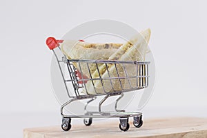 Tuna mayonnaise sandwich on mini shopping cart