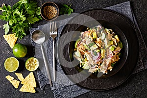 tuna salad with avocado, onion, cucumber, capers