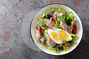 Tuna salad in bowl. Mediterranean food. Fresh salad with canned tuna fish. Healthy diet food photo