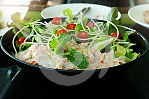 Tuna Salad with fresh mint and cherry tomato. Home made food. Concept for a tasty and healthy meal