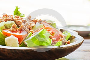 Tuna salad with red raw tomato, fresh lettuce. Hight vitamins and low fat for loose weight. Heathy food concept