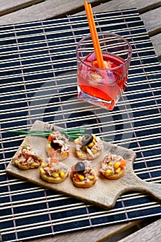 Tuna salads on bread and Aperol Spritz