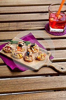 Tuna salads on bread and Aperol Spritz