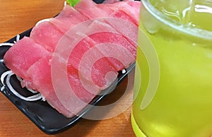 Tuna sashimi and ice green tea