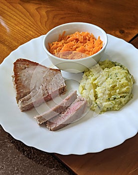Tuna steak with mashed potatoes and carrot