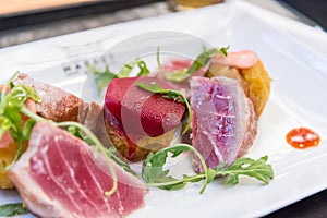 Tuna steaks served in Mercado da Ribeira in Lisbon, Portugal