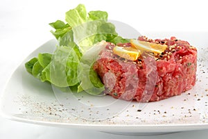 Tuna tartare isolated in white photo