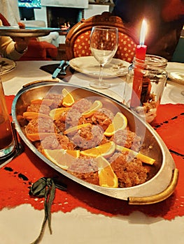 Tuna tartare in the orange juice, italian traditional dish for Chrismast, Italian food