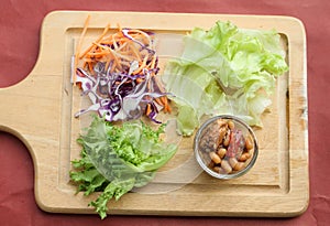 Tuna and white bean mix with mixed vegetable for cooking of tuna salad.