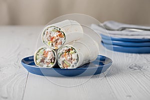 Tuna wraps with avocado tomato and mayonnaise