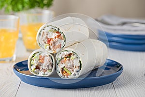 Tuna wraps with avocado tomato and mayonnaise