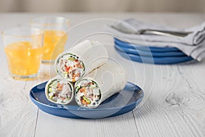 Tuna wraps with avocado tomato and mayonnaise