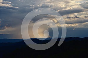 Tunderstorm, Cloudburst Above the natural forest in the middle of the valley. concept bad weather Should be planned before leaving