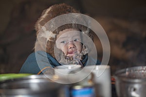 Tundra, The extreme north, Yamal, the pasture of Nenets people, children on vacation playing near reindeer pasture