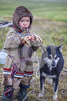 Tundra, The extreme north, Yamal, the pasture of Nenets people, children on vacation playing near reindeer pasture