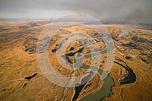 tundra fire. Burning dry grass and peat bogs, fire and smoke in