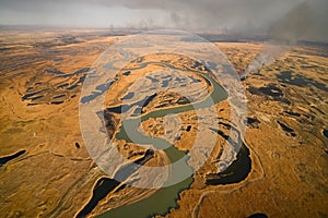 tundra fire. Burning dry grass and peat bogs, fire and smoke in