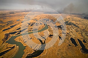 tundra fire. Burning dry grass and peat bogs, fire and smoke in