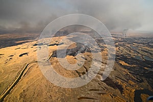 tundra fire. Burning dry grass and peat bogs, fire and smoke in