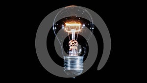 Tungsten light bulb lamp blinking over black background, loop