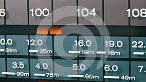 Tuning Analog Radio Dial Frequency on Scale of the Retro Receiver.