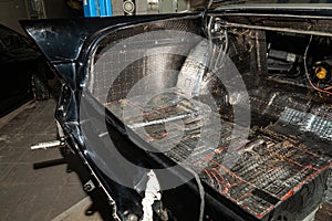 Tuning the car in a sedan body with three layers of noise insulation of the trunk. Audio and vibration isolation. Soft material.