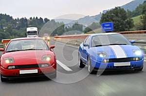 Tuning cars racing on highway