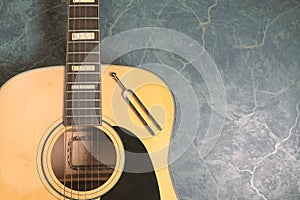 Tuning fork and acoustic guitar