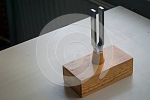 Tuning fork on a hollow wooden box