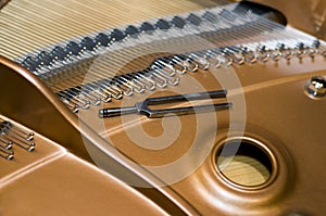 Tuning fork on a piano