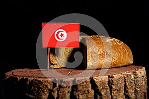 Tunisian flag on a stump with bread