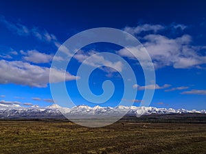 Tunka valley and photograph the sno w-capped mountains of Eastern Sayan on a Sunny winter day. Christmas holidays, winter travel