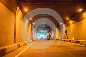 tunnel car motion blur night traffic fast